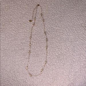 Gold necklace with pale green crystal stones